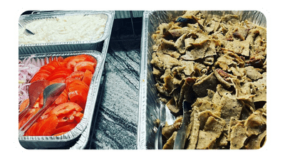Shows the image of Gyro meat, tomatoes, onions and Tzatziki sauce to showcase event catering.